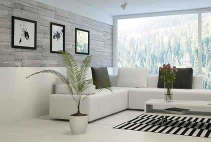 Modern living room interior with stone wall and artworks